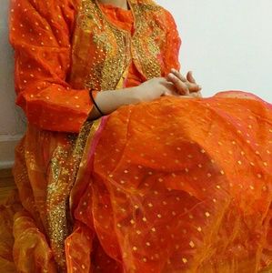 Vibrant Pakistani dress with jacket and pants